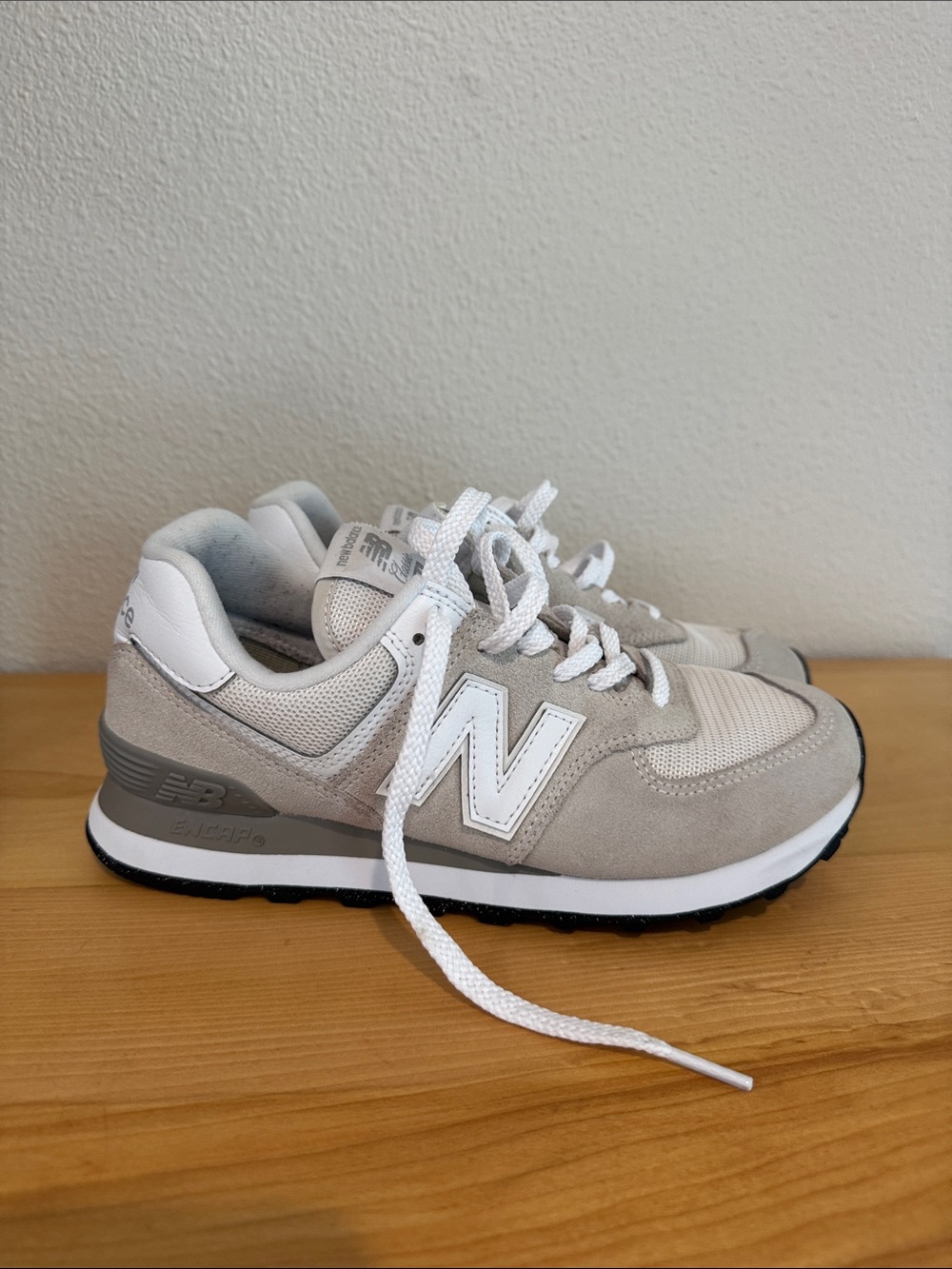 New Balance Women's Athletic Sneakers in Gray and White
